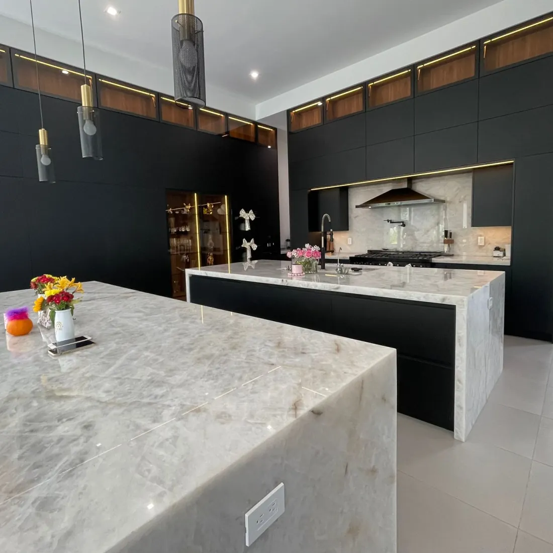 Luxury marble and black kitchen, professionally cleaned