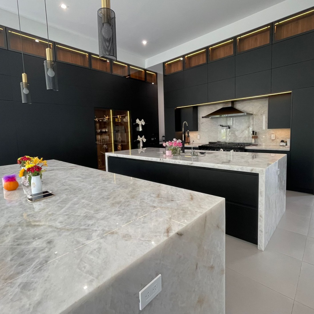 Luxury marble and black kitchen, professionally cleaned